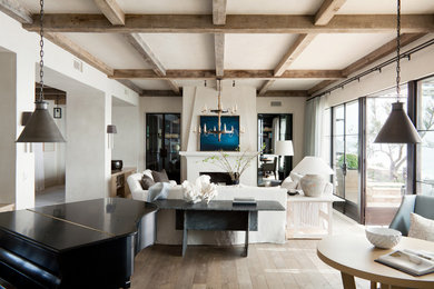 Example of a tuscan family room design in Orange County