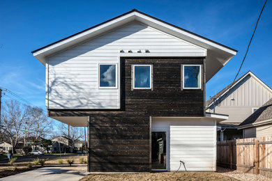 Mid-sized minimalist home design photo in Austin