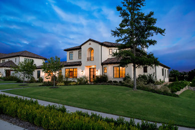 Inspiration for a mediterranean exterior home remodel in Dallas