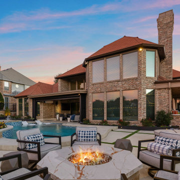 Custom Outdoor Living Pool Deck with Stamped Concrete & Turf