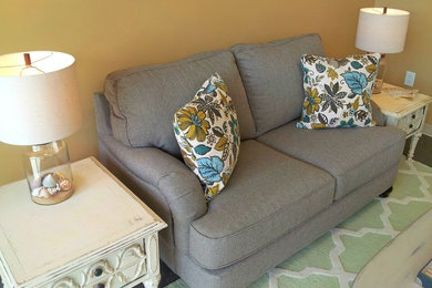 Inspiration for a mid-sized contemporary entryway remodel in DC Metro with beige walls and a glass front door