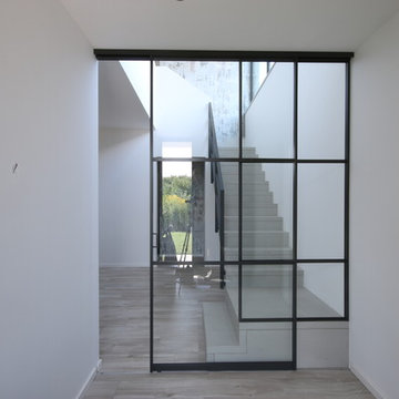 Windfang - Schiebetür im Industriestil