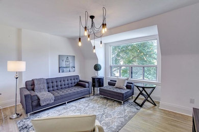 Inspiration for a small contemporary living room remodel in Toronto with gray walls