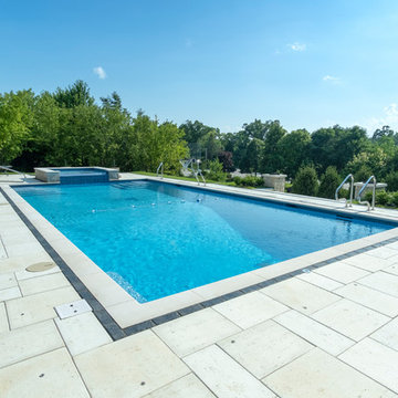 Burr Ridge Lap Pool with Raised Hot Tub and Waterfall