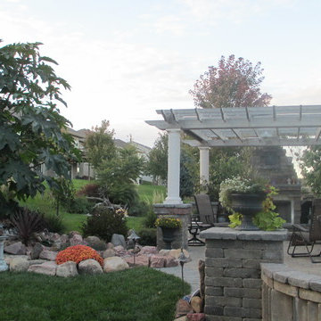 Paver Patio with Fire Place and Pond