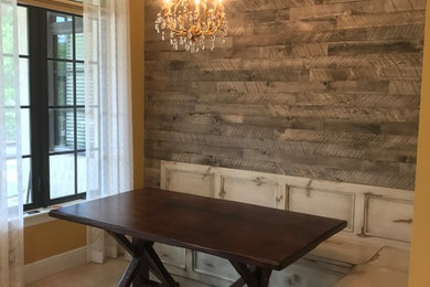 This is an example of a mid-sized country l-shaped open plan kitchen in Miami with distressed cabinets.