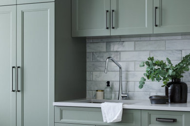Inspiration for a transitional laundry room remodel in Other