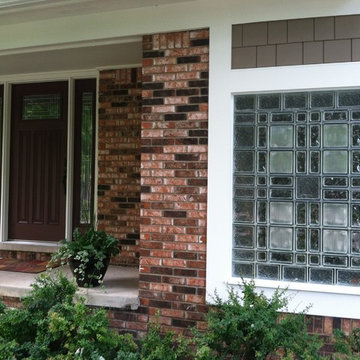 Decorative glass block window styled to match a Craftsman entry door
