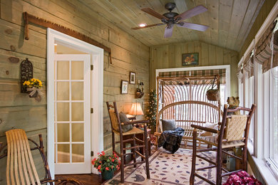 Mid-sized mountain style formal and enclosed dark wood floor living room photo in Other with brown walls, no fireplace and no tv