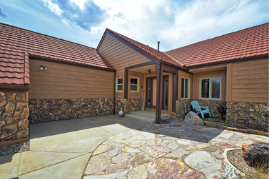 Inspiration for a rustic exterior home remodel in Denver