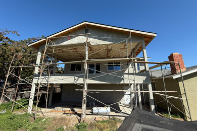 Example of a stucco exterior home design in Sacramento
