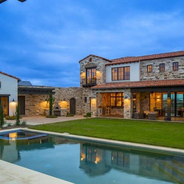 Contemporary Italian Farmhouse by John Siemering Homes Austin TX