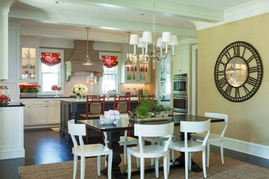 Kitchen/dining room combo - mid-sized transitional dark wood floor kitchen/dining room combo idea in Minneapolis with white walls
