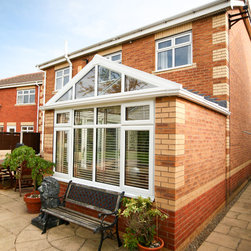 White Conservatory with PVCu Bi-Fold Doors - Products
