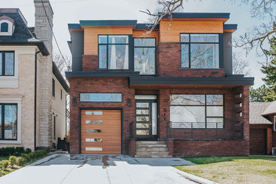 Example of a trendy exterior home design in Toronto