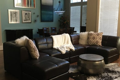 This is an example of a modern family room in Houston.