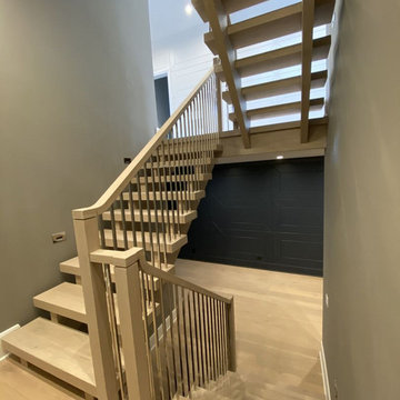White Oak Stairs with Polished Stainless Steel Balusters