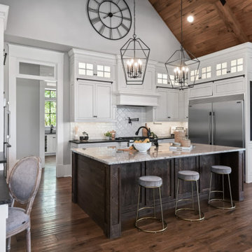 Modern Farmhouse Kitchen with Vaulted Wood-Beam Ceiling & Open-Concept Design