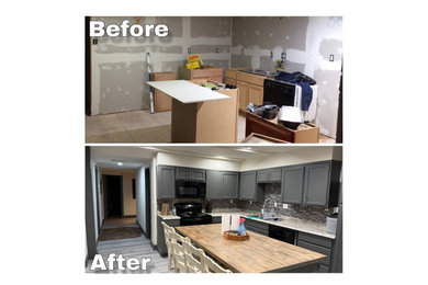 Example of a mid-sized minimalist l-shaped vinyl floor and gray floor eat-in kitchen design in Dallas with a double-bowl sink, shaker cabinets, blue cabinets, laminate countertops, gray backsplash, ceramic backsplash, black appliances, an island and gray countertops