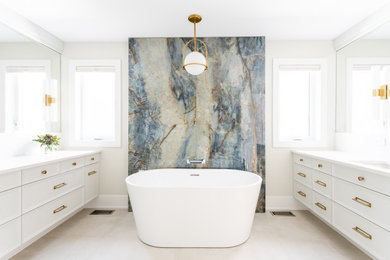 Example of a large transitional porcelain tile and double-sink bathroom design in Ottawa with an undermount sink, solid surface countertops, a hinged shower door and white countertops