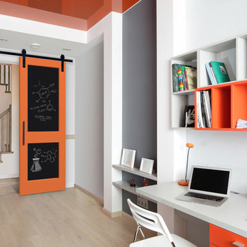 Use Masonite barn door hardware and a chalkboard door to help you focus.