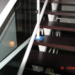 Steel stairs with glass panel - Products