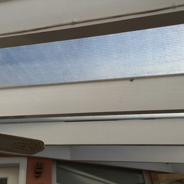 Conservatory roof shutters