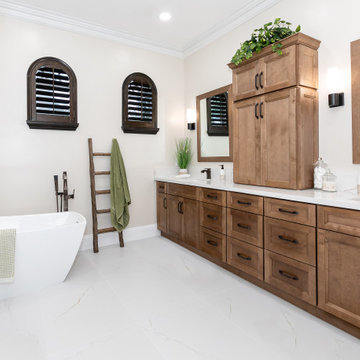Elegant Earth Tones Transitional Master Bathroom with Freestanding Bathtub