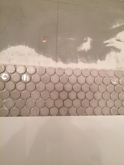 Penny tile accent in shower