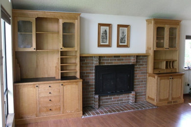 Fireplace cabinetry surround with mantle shelf