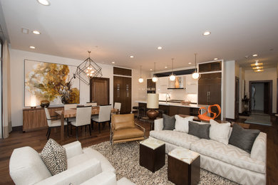 Living room - mid-sized mid-century modern open concept medium tone wood floor and brown floor living room idea in Other with white walls and a media wall
