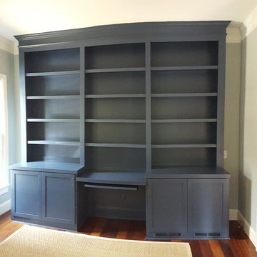 Dark Blue Office Built-in With Center Desk and Pullouts