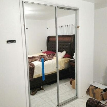 Mirrored sliding doors for bedroom