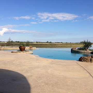 Freeform Travertine Pool with Negative Edge