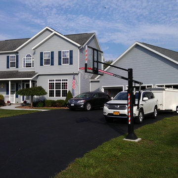 Brett J's Pro Dunk Silver Basketball System on a 130x35 in Whitesboro, NY