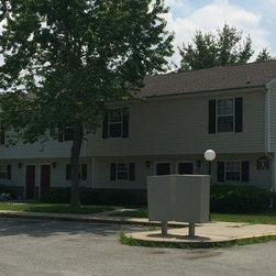 Old 3-Tab Shingle Removal on Entire Apartment Complex - Roofing And Gutters