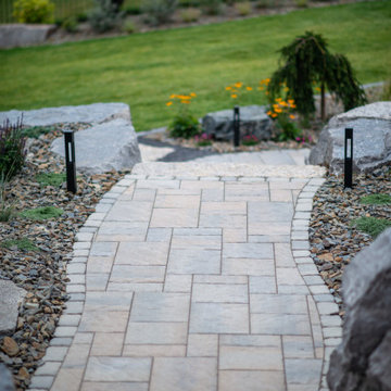 Luxury Backyard Retreat with Armour Stone & Water Feature | Genesis on the Lakes