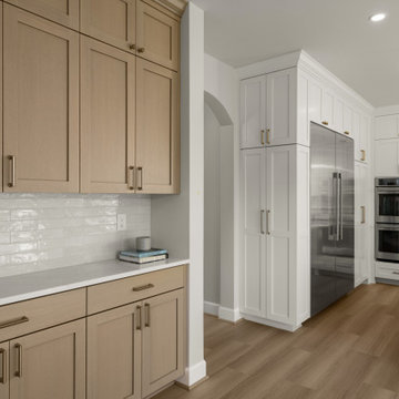Two-Tone Cabinetry with Beverage Station in a Transitional Kitchen