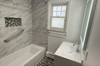 Inspiration for a small single-sink bathroom remodel in New York with shaker cabinets, white cabinets, white countertops and a freestanding vanity