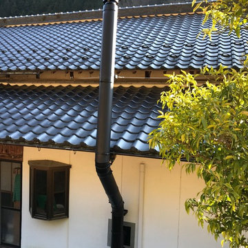 薪ストーブ 煙突 設置風景