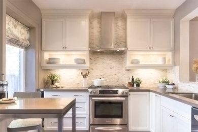 Transitional dark wood floor kitchen photo in Toronto with an undermount sink, shaker cabinets, quartz countertops, multicolored backsplash, stone tile backsplash and stainless steel appliances