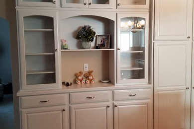 Inspiration for a mid-sized transitional u-shaped light wood floor and beige floor eat-in kitchen remodel in San Francisco with a double-bowl sink, raised-panel cabinets, white cabinets, quartz countertops, blue backsplash, stone slab backsplash, stainless steel appliances, a peninsula and blue countertops