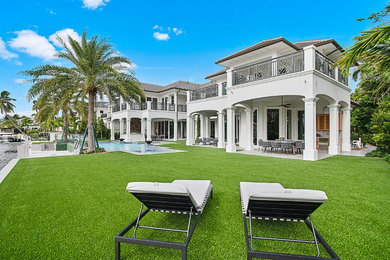 Example of a transitional exterior home design in Miami
