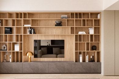 Ispirazione per un piccolo soggiorno minimalista con libreria, pareti beige, parquet chiaro, TV a parete, pavimento marrone e tappeto