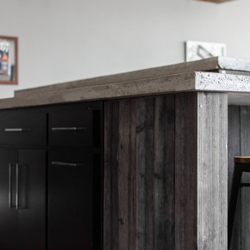 Rustic bar with concrete countertops