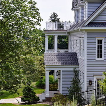 Traditional House Overlooking Water