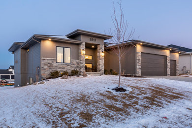 Example of a minimalist exterior home design in Omaha