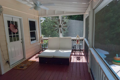 Deck - mid-sized transitional backyard deck idea in Atlanta with a roof extension