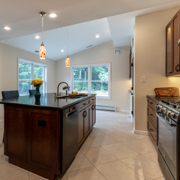 Cheerful Multi Level Rear Addition to Expand Kitchen, Mudroom & Sunroom in Oakt