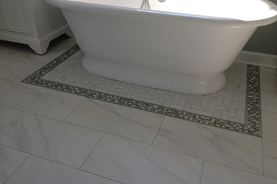 Inspiration for a coastal master porcelain tile bathroom remodel in Other